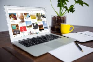 Composite image of office desk with laptop and documents